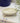 AARVEN handmade white soapstone soap dish on a tiled surface.