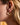 AARVEN brass Sun Mask Hoop Stud Earrings ethically made in Kenya with modern African style.