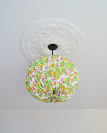 AARVEN Origami Paper Lightshade Globe Water Lilies hanging as a pendant lightshade ceiling feature in a modern living room.