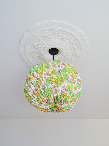 AARVEN Origami Paper Lightshade Globe Water Lilies hanging as a pendant lightshade ceiling feature in a modern living room.