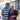 A female and male artisan in Kenya holding jewellery for ethical jewellery brand AARVEN
