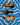 Three wooden spoons on a blue and white wavy-patterned surface