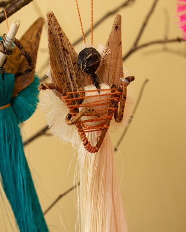 Intricately crafted African angel ornament for holiday decoration