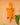 AARVEN orange and mustard Ghanaian crocodile wall art on peach background with plants in foreground.