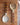 Wooden spoon and fork with chevron pattern handles on a wooden surface