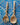 Wooden spoon and fork on a blue and white patterned tile background