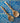 Wooden spoon and fork set on a blue and white wavy tile pattern