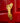 Gold lobster-shaped door knocker on a red door