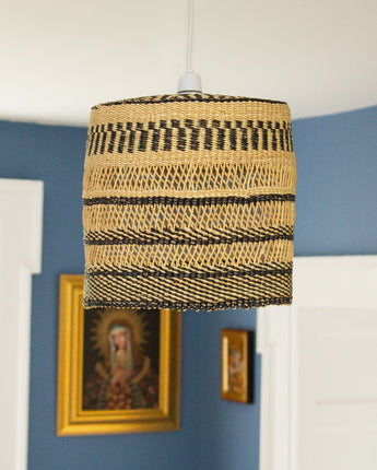 Ghanaian rattan ceiling light shade with open weave design