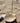 Shell incense burner with a stick on a sandy surface, handmade by artisans in Kenya from soapstone for AARVEN.