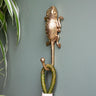 Handcrafted Ghanaian Ashanti brass hook featuring frog design