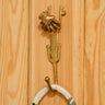 Handcrafted Ghanaian Ashanti brass hook with lion design for coats or keys