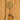 Handcrafted Ghanaian Ashanti brass hook in a sunflower shape
