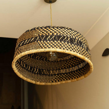Artisan wicker pendant lamp shade handmade in Ghana with geometric weave