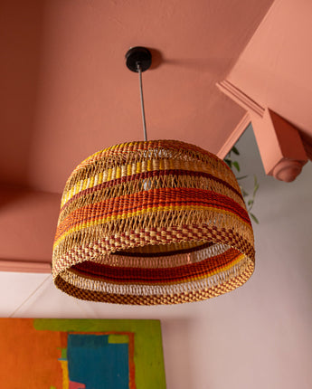 AARVEN handmade Ghanaian lampshade with earthy tones and organic texture.