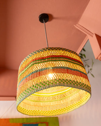 Colourful woven lampshade from AARVEN’s Ghanaian home collection.