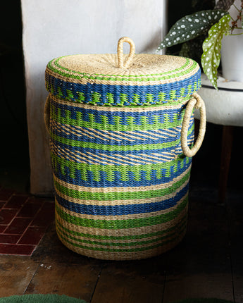 Handmade Ghanaian woven laundry basket made from sustainable natural fibres.