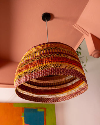 Handmade Ghanaian woven lightshade crafted from sustainable natural fibres.