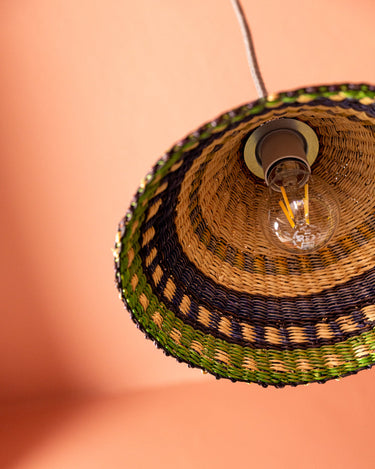Close up of AARVEN Ghanaian Hand Made Light shade, coolie light shade in blue, green and natural rattan, woven by artisans in Africa