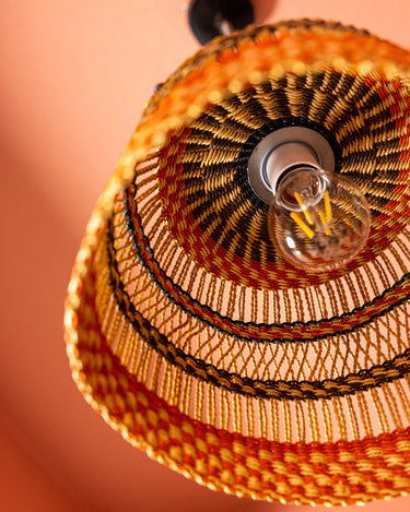 Textured wicker-style lightshade adding an organic touch to home decor.
