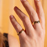 AARVEN Kilifi brass ring with polished texture and handcrafted finish.