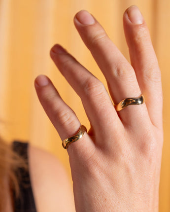 AARVEN Kilifi brass ring with polished texture and handcrafted finish.