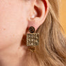 Elegant Almasi brass earrings by AARVEN with distinctive geometric detailing.