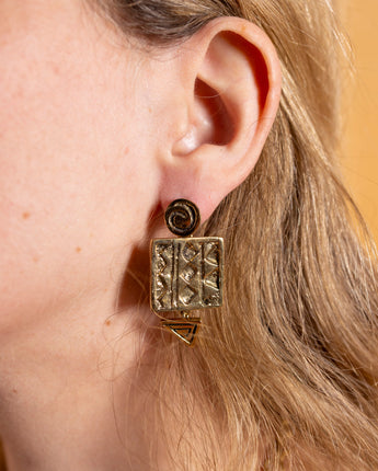 Elegant Almasi brass earrings by AARVEN with distinctive geometric detailing.