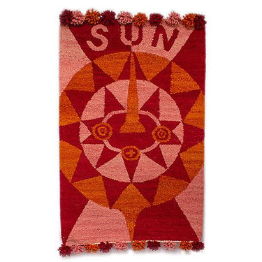 Kenyan woven wall tapestry with Sun Mask design