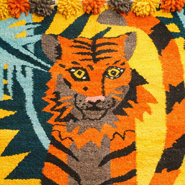 Colourful woven wall tapestry hanging from AARVEN, a unique artwork for wall that brings tapestry art UK charm to any space.